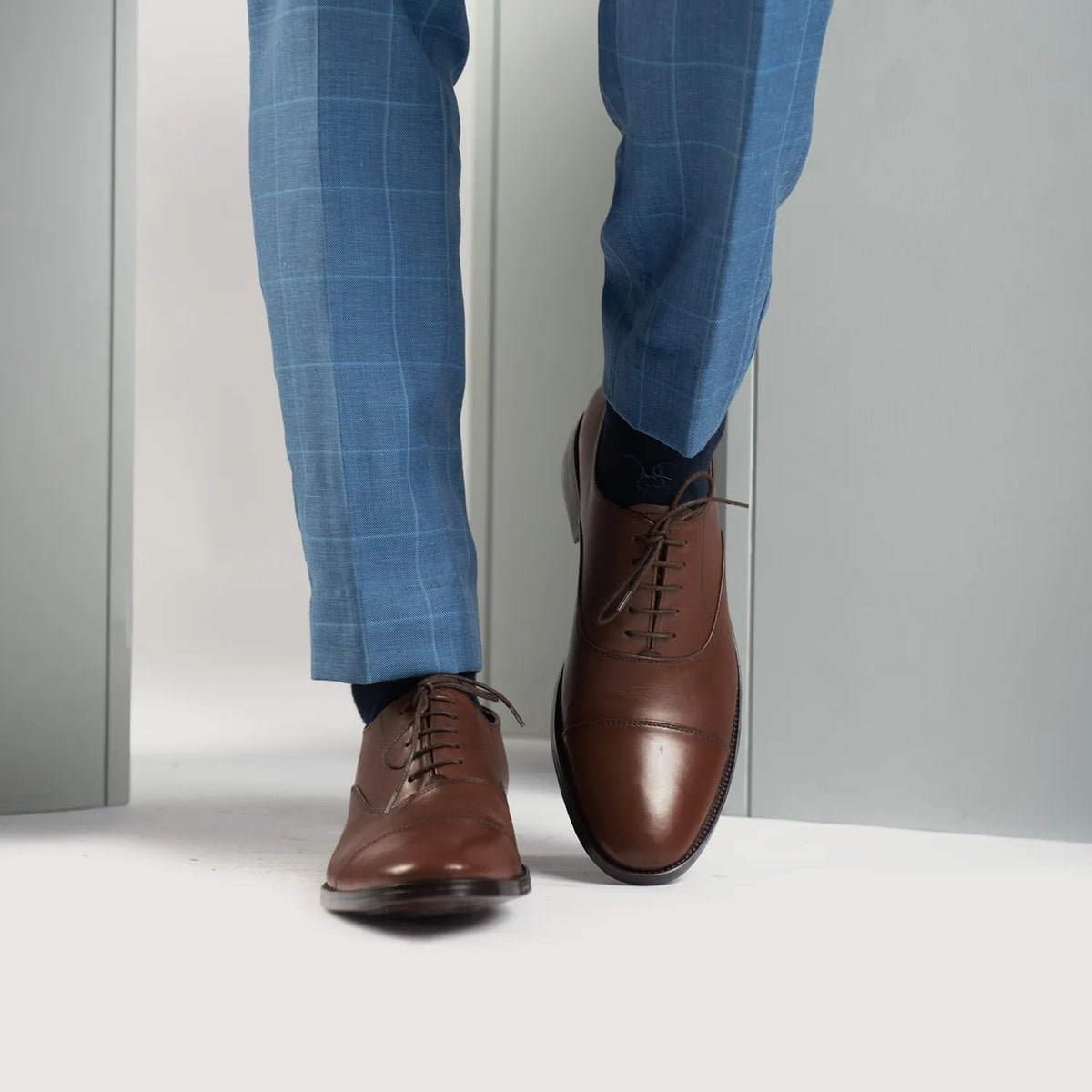Styled On-Foot Perspective Demonstrating Ankle Fit & Silhouette on Model