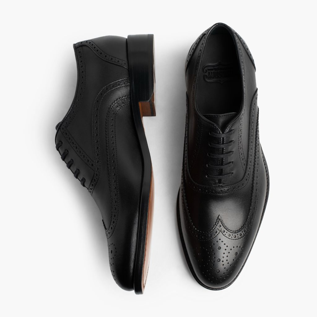 Aviator Preto Mocassins em couro para Homem - Vista lateral mostrando o corte ergonómico de mangas