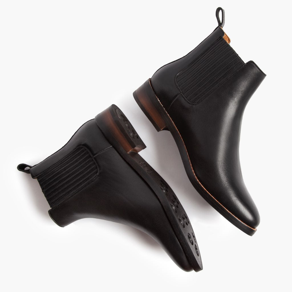 High-Traction Rubber Outsole & Lug Tread Pattern on Dreamer Preto Botas em couro para Mulher