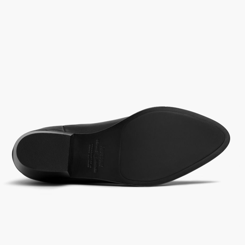 High-Traction Rubber Outsole & Lug Tread Pattern on Dreamer Bootie Preto Botas em couro para Mulher