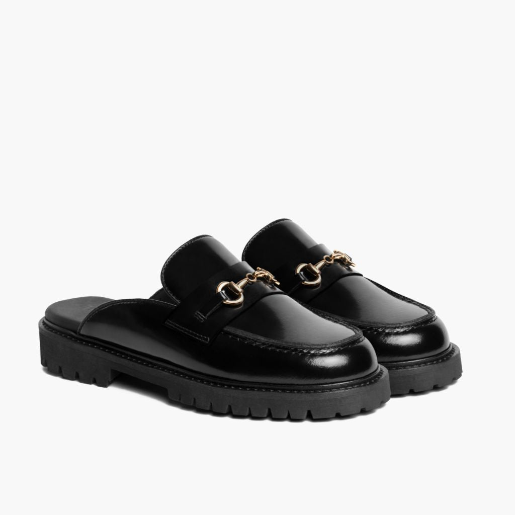 Penny Mule Preto & Gold Mocassins em couro para Mulher em couro bovino preto legítimo - Vista de perfil | Comprar online