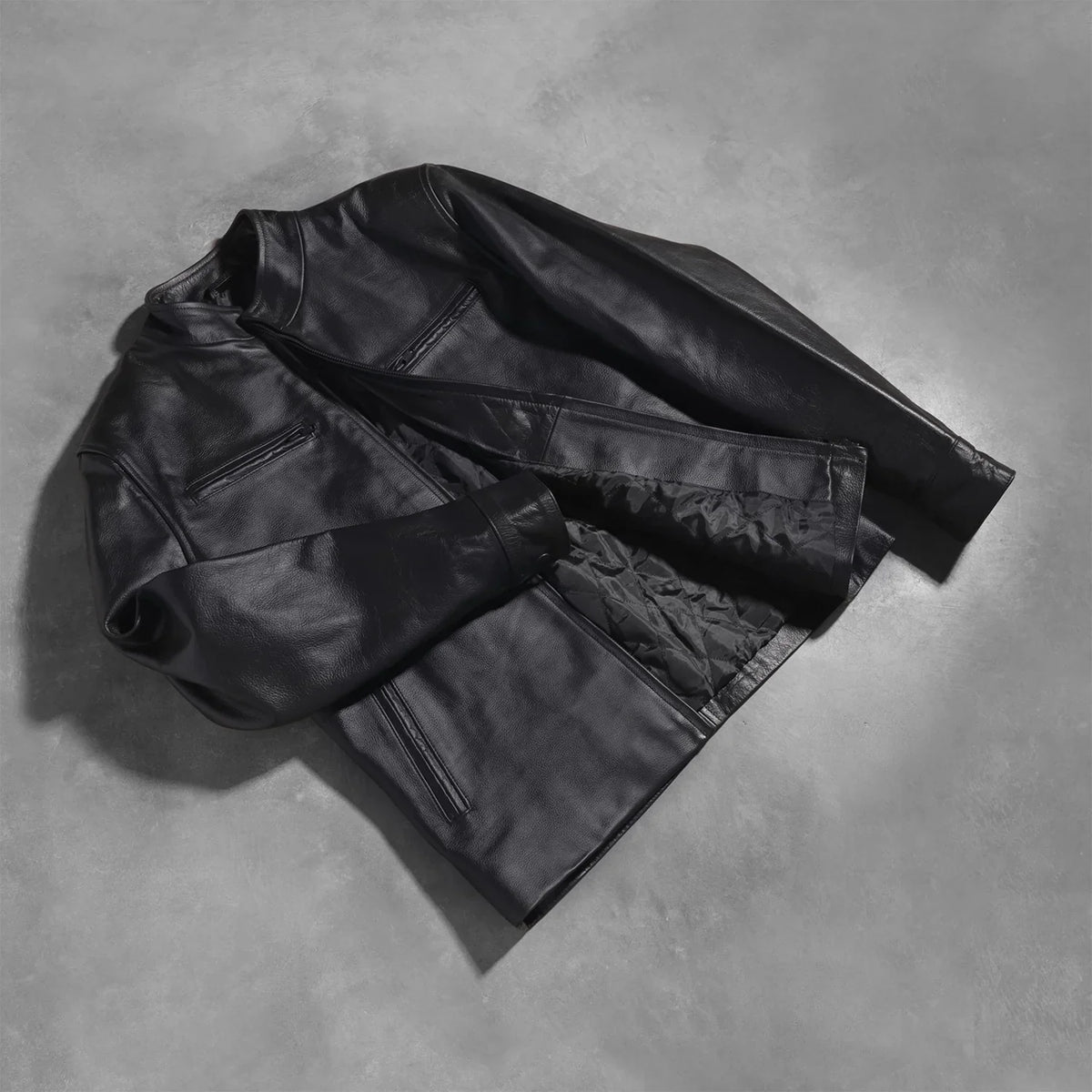Styled Fit Perspective of Austere Matte Preto Blusão Biker de Couro para Homem on Model - Natural Daylight Drape
