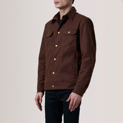 
Colberto Castanho Waxed Canvas Trucker Jaqueta de Couro para Homem For Men - Vista lateral mostrando o corte ergonómico de mangas
