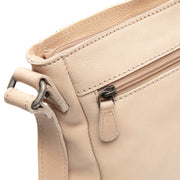 
100% Full-Grain Wax Pull-Up 100% Full-Grain Leather Grain Texture & Handcrafted Patina Detail