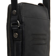 
Alesund Couro Flor Integral Phone Bag - Vista lateral mostrando o corte ergonómico de mangas