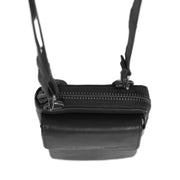 Styled Fit Perspective of Malaga Full-Grain Leather Phone Bag para Mulher on Model - Natural Daylight Drape