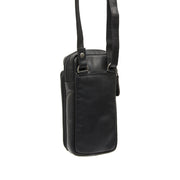 Styled Fit Perspective of Valdes Full-Grain Leather Phone Bag para Mulher on Model - Natural Daylight Drape