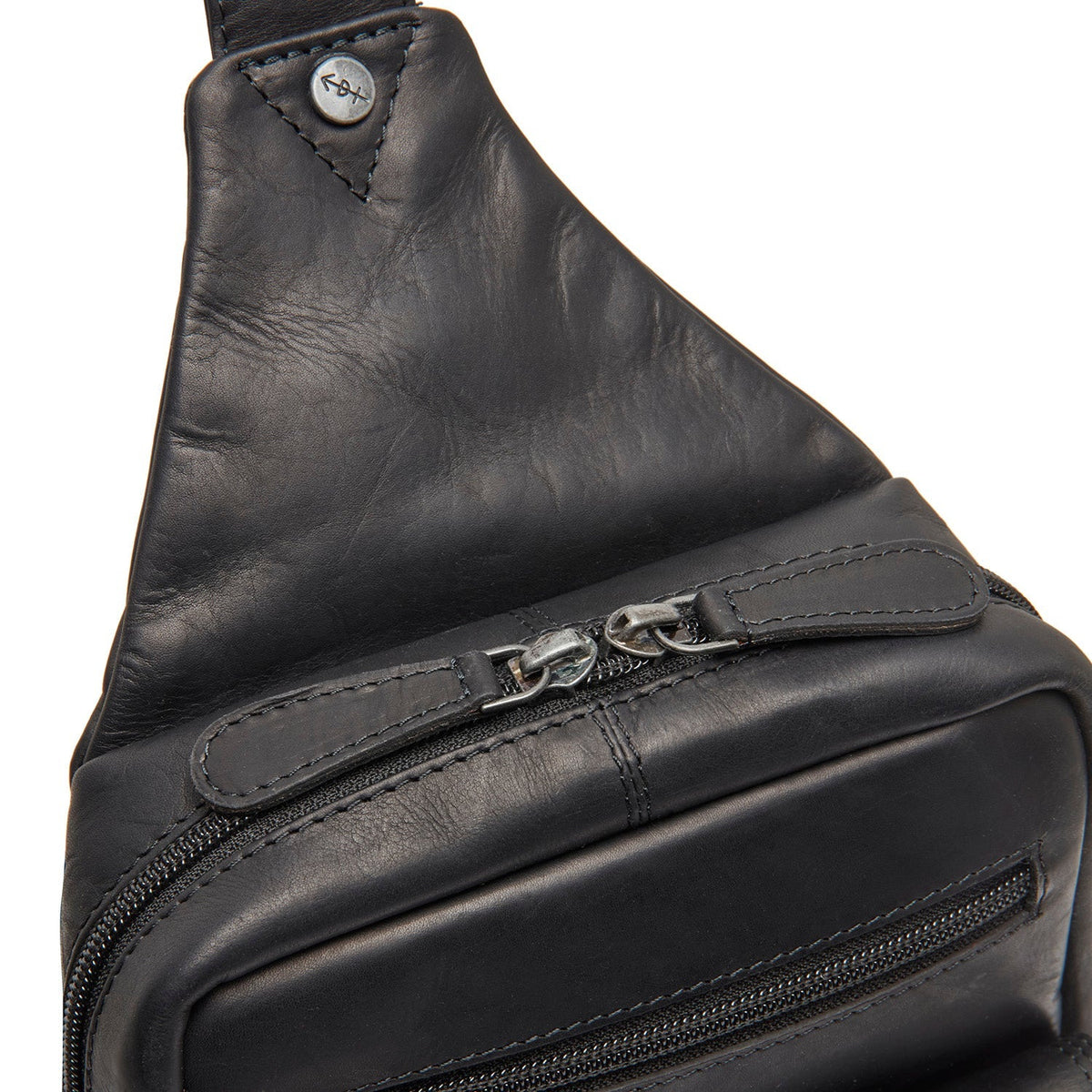 
Solid Antique Brass Hardware & Heavy-Duty Dual Zipper Detail on Leather Sling Bag Turelle