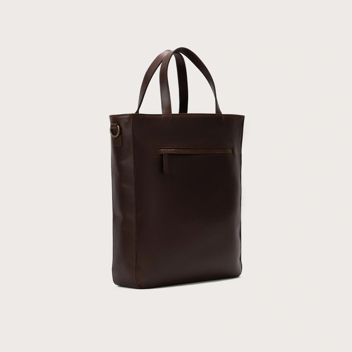 
The Poet Vintage Brown Leather Tote Bag For Men & Women - Perfil lateral estruturado com fole espaçoso